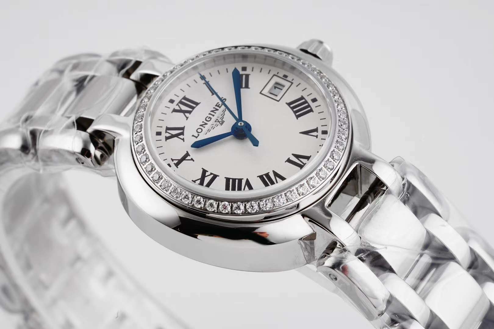 primaluna white dial with roman markers and Di*m*nd bezel
