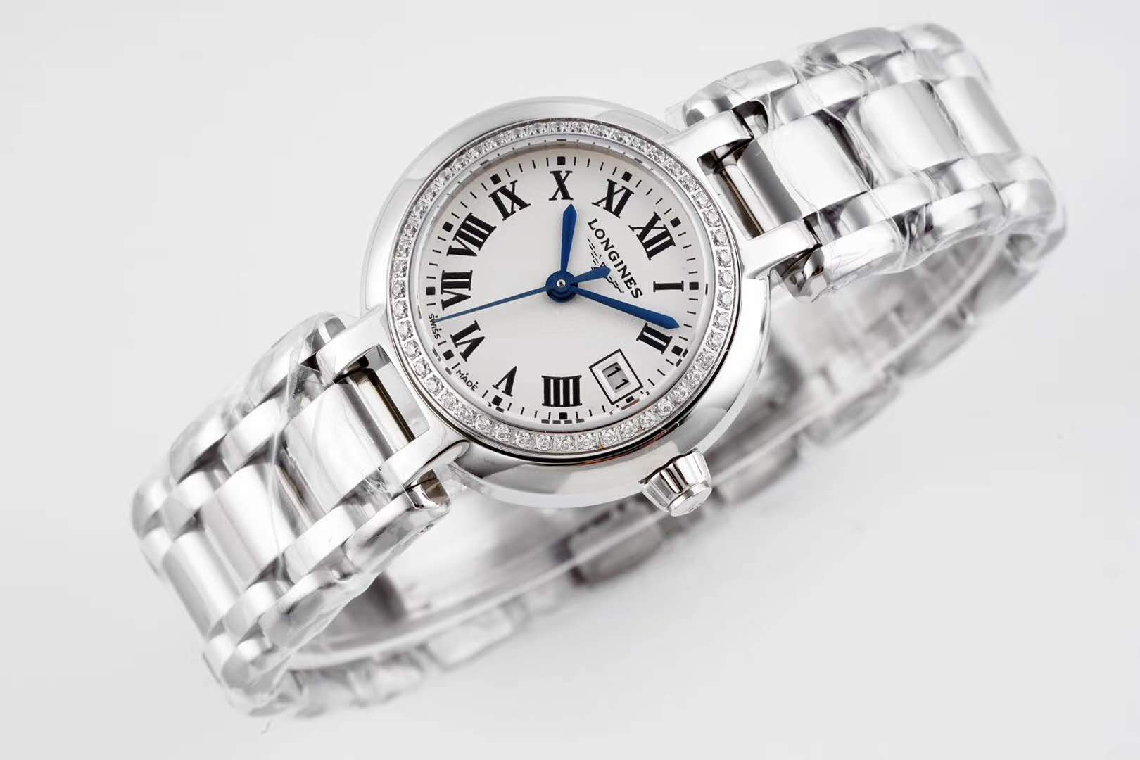 primaluna white dial with roman markers and Di*m*nd bezel