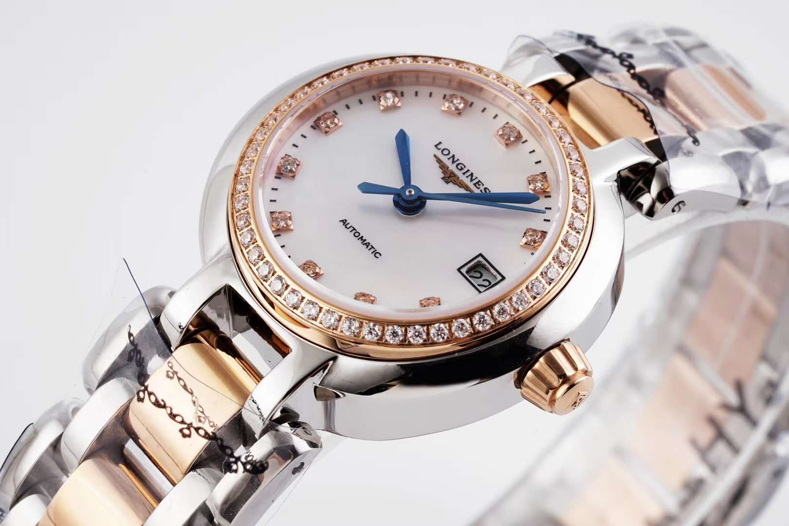 primaluna mop white dial with Di*m*nd markers and Di*m*nd bezel in rose gold