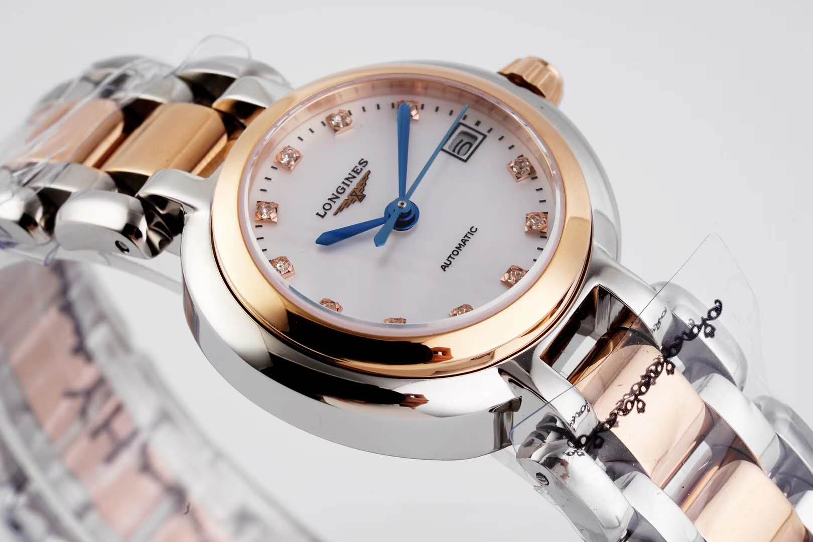 primaluna mop white dial with Di*m*nd markers in rose gold