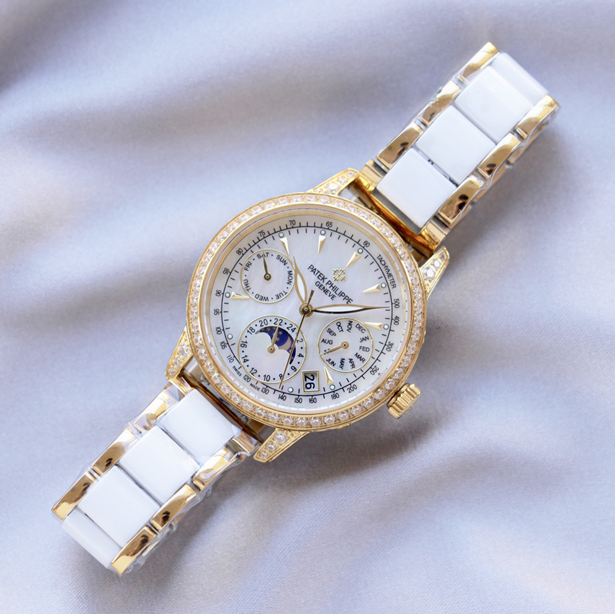 grand complications ladies first perpetual calendar with Di*m*nd bezel in yellow gold